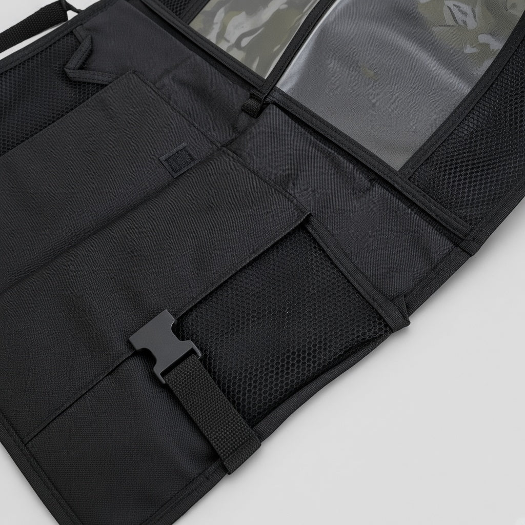 Seat back organizer pockets and buckle detail